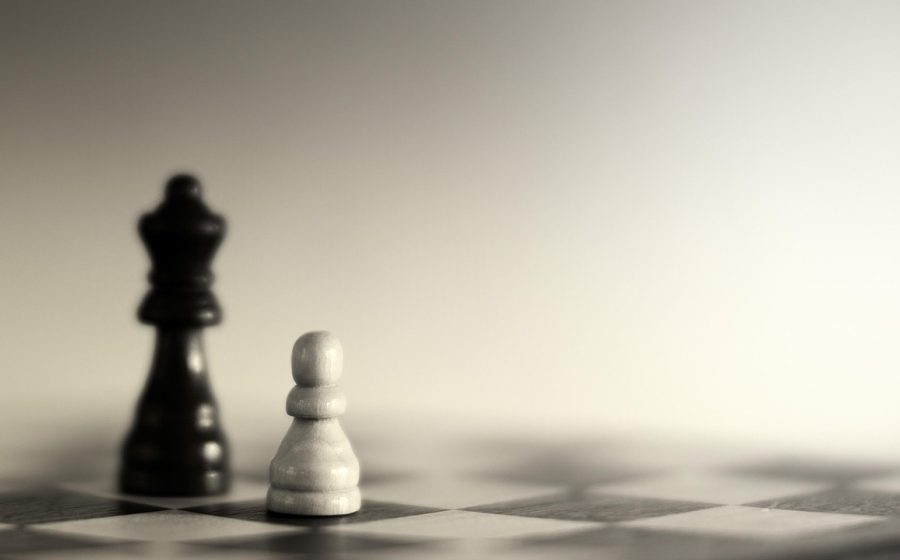 游戏合库的免费在线小游戏分类索引界面截图，左侧是休闲、益智、动作等体裁标签，右侧是带一句上手说明的游戏卡片列表，奶油色背景配砖红点缀，排版留白克制